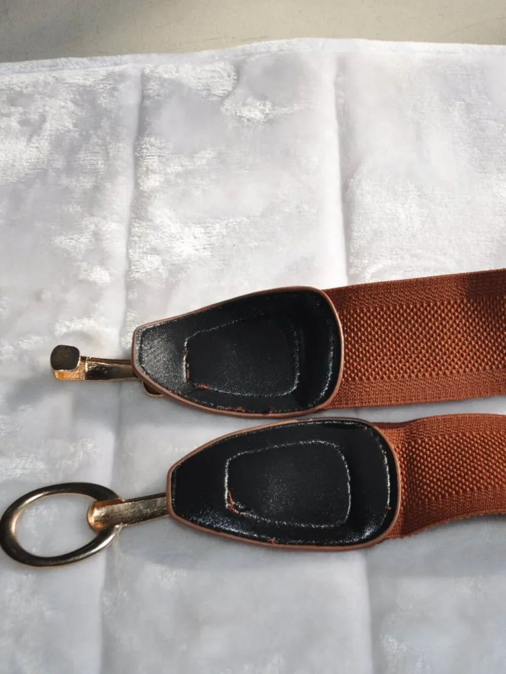 Women's brown Vince Camuto faux leather elastic wide belt features a gold circle